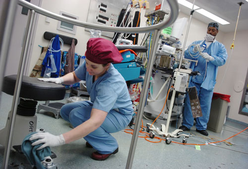 two medical workers in a medical room